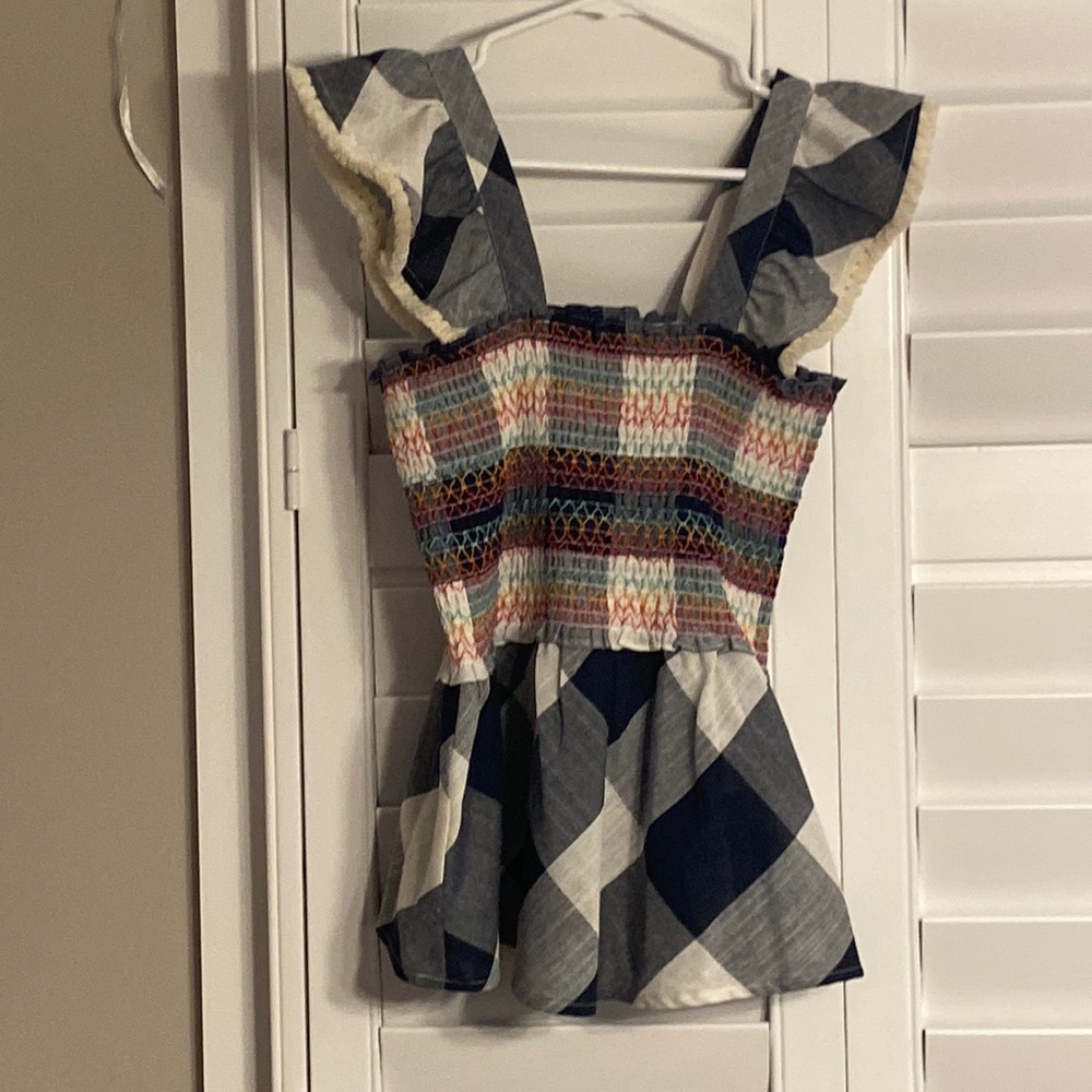 Excellent condition HML peplum top. Size Small.